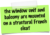 the window unit and balcony are mounted on a structural French cleat 